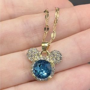 Disney Mickey Mouse Gold tone Necklace. Blue Stone.